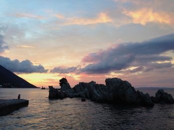 Scenic view of sea at sunset