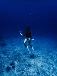 Man swimming in sea