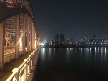 Illuminated buildings at waterfront