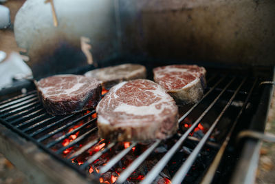 Close-up of meat on barbecue grill