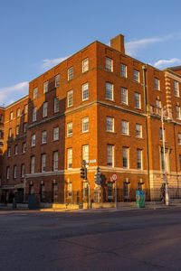Exterior of building in city against clear sky
