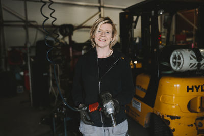 Female mechanic in garage