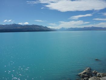 Scenic view of sea against blue sky