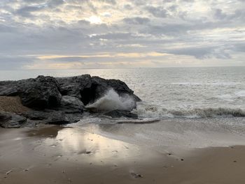 Scenic view of sea against sky during sunset