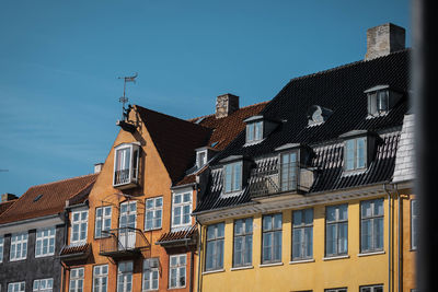 Low angle view of residential buildings against sky