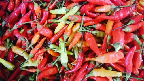 Full frame shot of chili peppers for sale at market stall