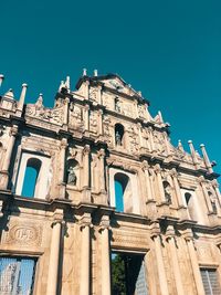 Low angle view of historic building against clear sky