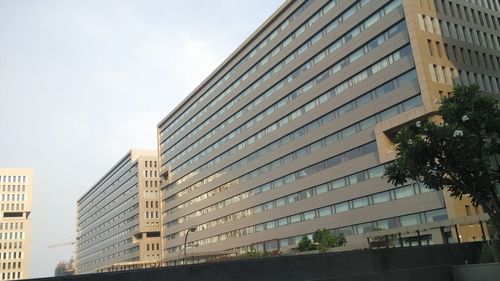 Modern office building against sky