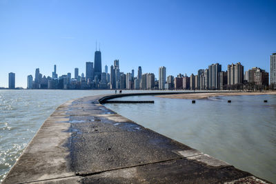 View of modern buildings against clear sky