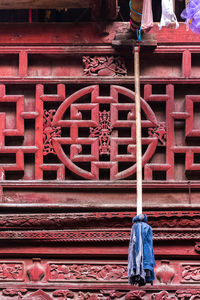 Full length rear view of cross in temple