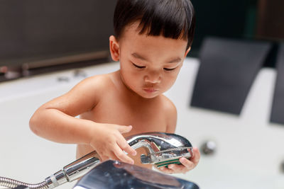 Boy playing baby