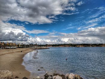 Scenic view of beach against sky