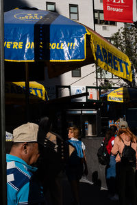 People on street in city