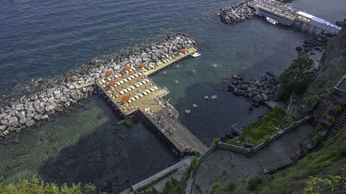 High angle view of illuminated ship in sea