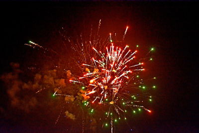 Firework display at night