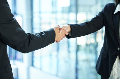 Business colleagues shaking hands