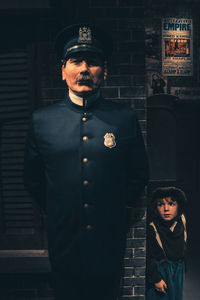Portrait of boy standing outdoors