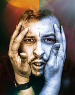 Close-up portrait of mid adult man