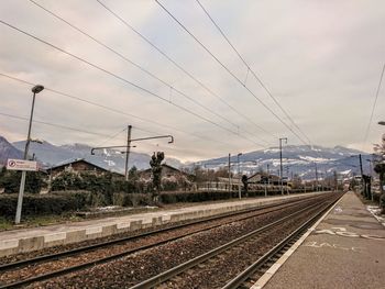 Railroad tracks against sky