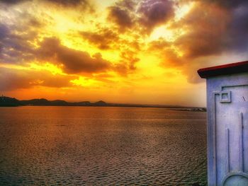 Scenic view of sea against dramatic sky