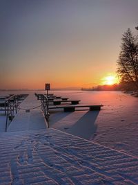Scenic view of sea against clear sky during sunset