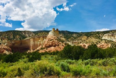 Panoramic view of landscape against cloudy sky