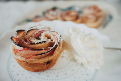 Close-up of fruitcake served in plate on table