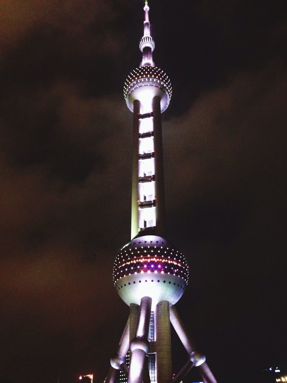 communications tower, communication, low angle view, tower, tall - high, international landmark, illuminated, famous place, television tower, tourism, capital cities, travel destinations, spire, fernsehturm, architecture, culture, built structure, travel, sphere, night