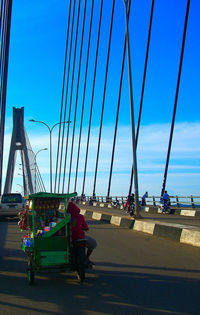 View of bridge against cloudy sky