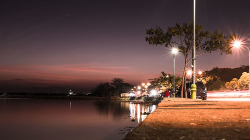 Scenic view of sea against sky at night