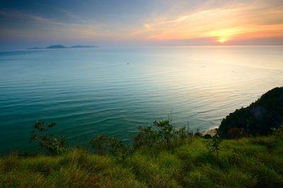 Scenic view of sea against sky during sunset