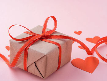 Close-up of gift box on pink background