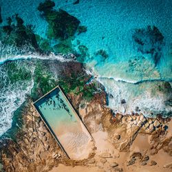 High angle view of rocks on beach