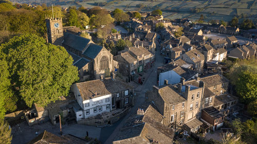 High angle view of houses and trees in town