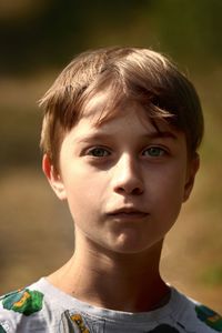 Close-up portrait of boy looking away