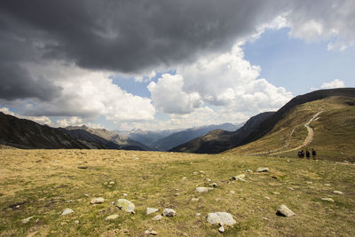 Scenic view of landscape and mountains against sky