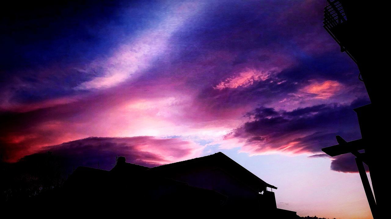 sky, cloud, architecture, darkness, building exterior, built structure, dawn, sunset, building, silhouette, dramatic sky, evening, afterglow, house, nature, no people, beauty in nature, night, low angle view, red sky at morning, light, residential district, outdoors, purple, scenics - nature