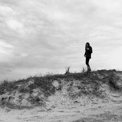 Silhouette of man standing on beach