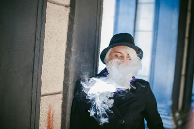 Close-up of man smoking cigarette