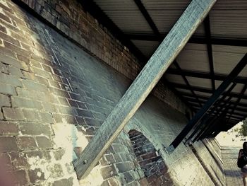 View of woman walking on wall