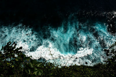 Scenic view of sea against sky at night