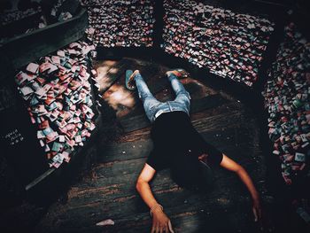 High angle view of woman sleeping on sofa