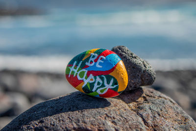 Close-up of multi colored rock on beach