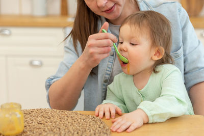 Close-up of boy playing with toy