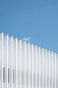 White building facade against blue sky