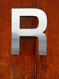 Close-up of rusty sign