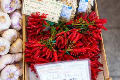 High angle view of red chili peppers for sale in market