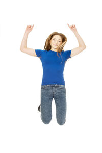 Portrait of a young woman against white background