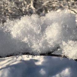 Close-up of snow against sky