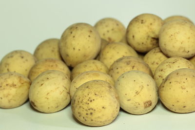 High angle view of eggs in white background